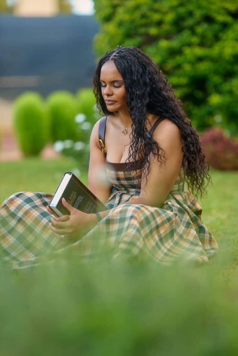 Leya praying over her child at home - prayer for parents