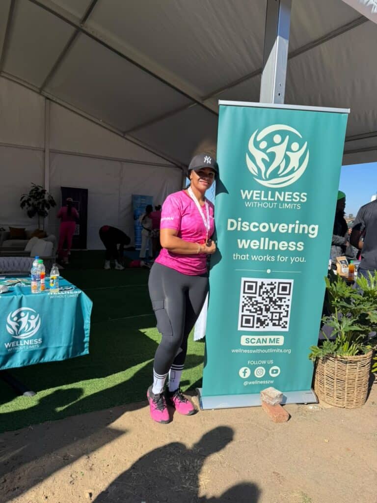 Leya Mnangagwa at the Wellness Without Limits stand at the Her Miles Women's Run, representing women's wellness community in Africa